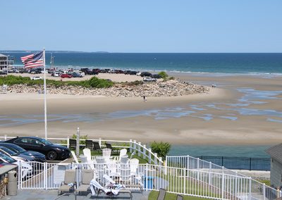 Balcony's view of our fire pits and the beach at low tide.