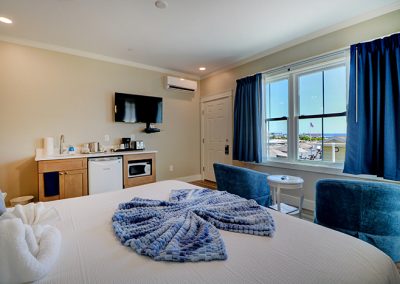 Room 74, view from interior corner toward the seating area and ocean view.